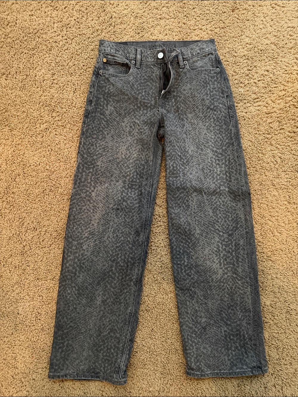 Women’s snake print jeans